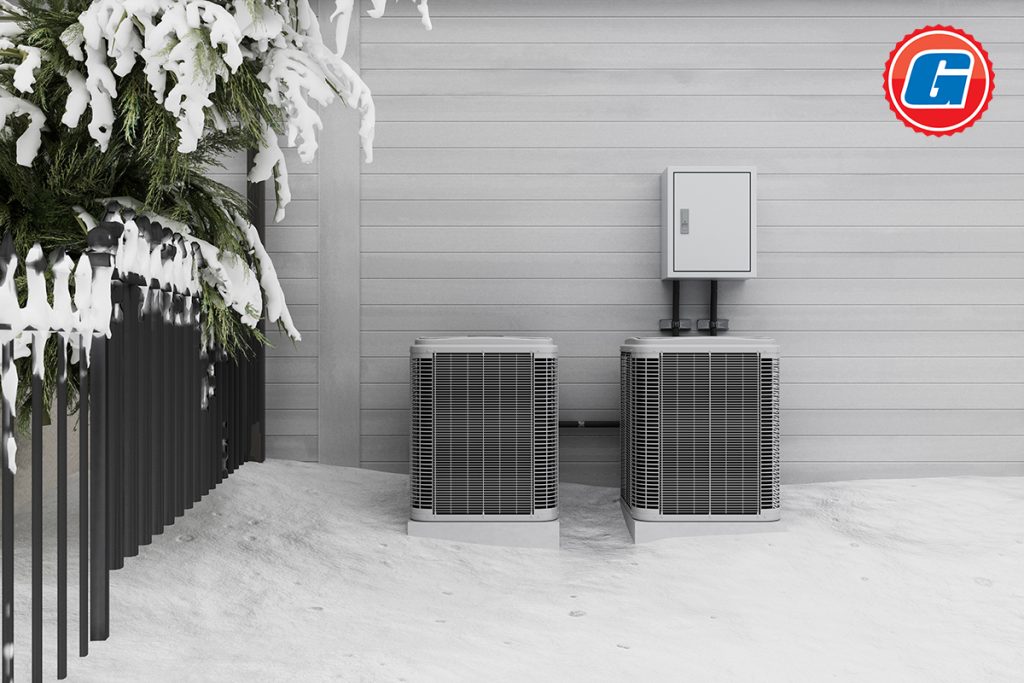Outdoor HVAC Units Covered in Snow During Winter